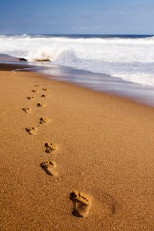 Holistic Therapies. Library Image: Footsteps in Sand